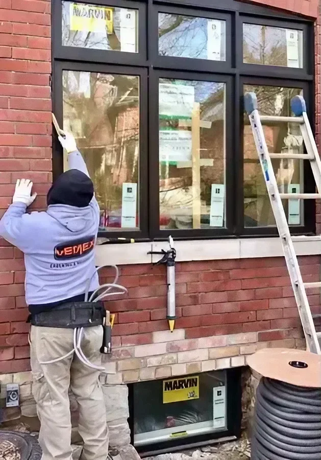 High-quality silicone caulking applied around exterior windows